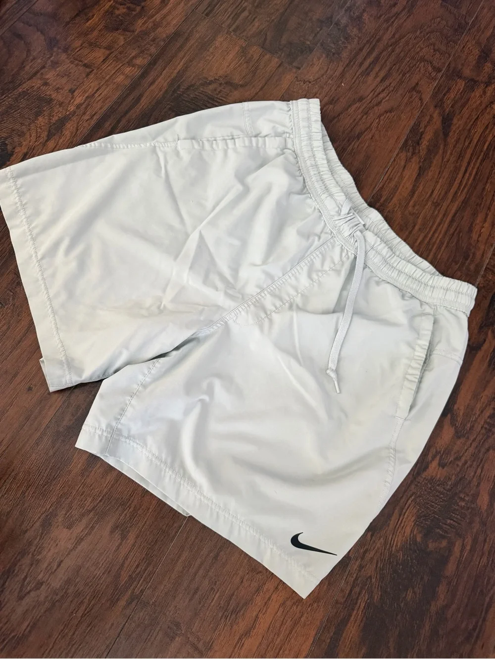Nike Men’s Light White Athletic Shorts with Black Swoosh